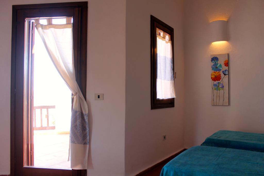 Appartement La Marmorata Vacation House à Santa Teresa Gallura Chambre photo