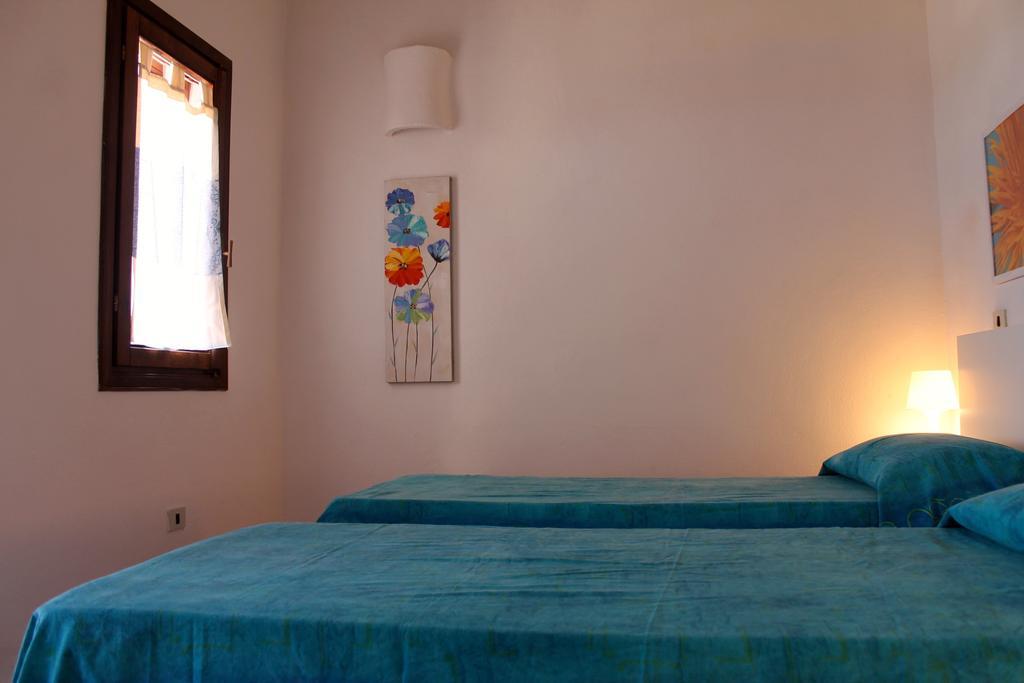 Appartement La Marmorata Vacation House à Santa Teresa Gallura Chambre photo